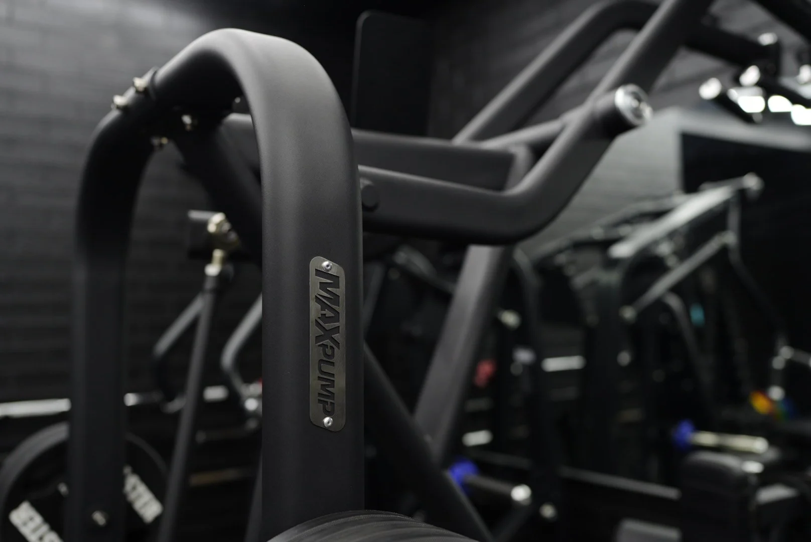 Close-up of matte black MaxPump plate-loaded equipment